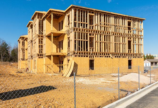 a snapshot of temporary chain link fences protecting a large construction project from unauthorized access in East Palo Alto